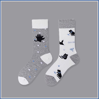 These Black Cat Pattern Socks are made of soft, breathable cotton with a fun and detailed cat design. Perfect for daily wear or as a cute gift for cat lovers.