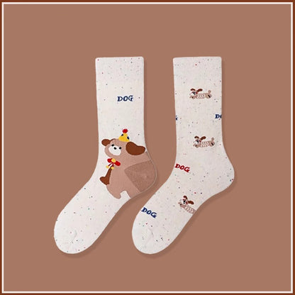 These dog pattern socks feature adorable puppy designs woven into soft, breathable cotton. Fun and cozy, they add personality and charm to any outfit — perfect for pet lovers and fashion enthusiasts alike.